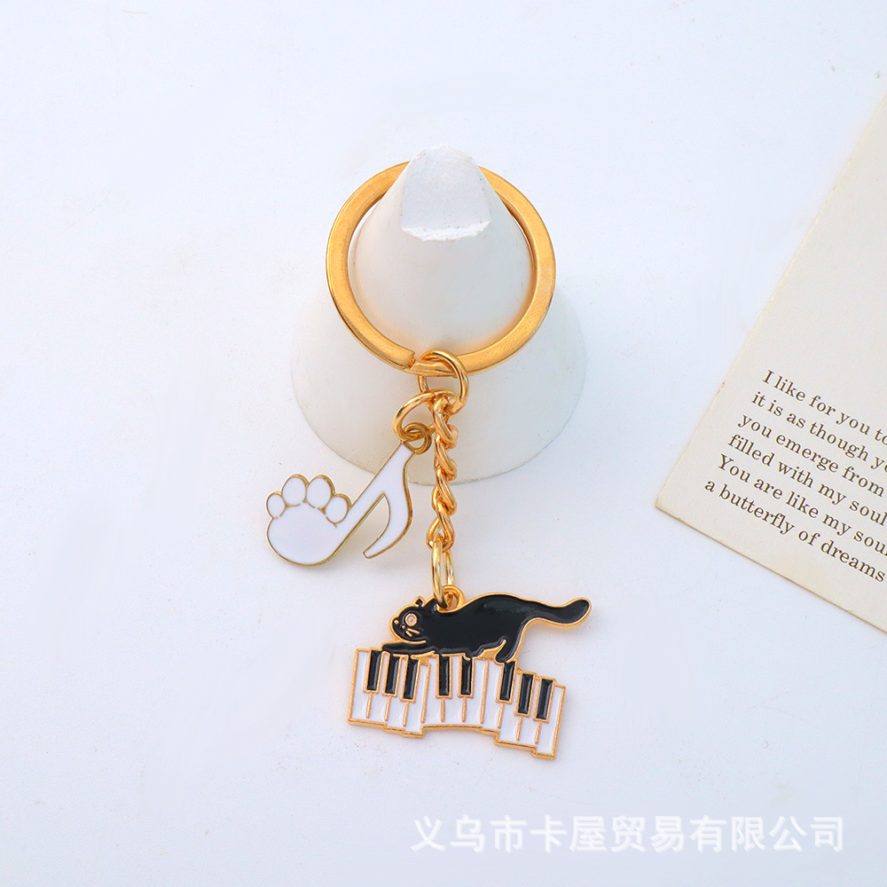 キーホルダー キャットミュージック  cantabile 在庫有りと書いてあっても、お取り寄せ商品は受注後にメーカー注文になります。☆【音符・小物グッズ－音楽雑貨】【音楽雑貨】  音楽グッズ  <br>バレエ発表会 記念品 プレゼントに最適 
